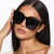 Damen Modische quadratische Sonnenbrille mit trendigem Rahmen und schützendem UV-Filter Karnz
