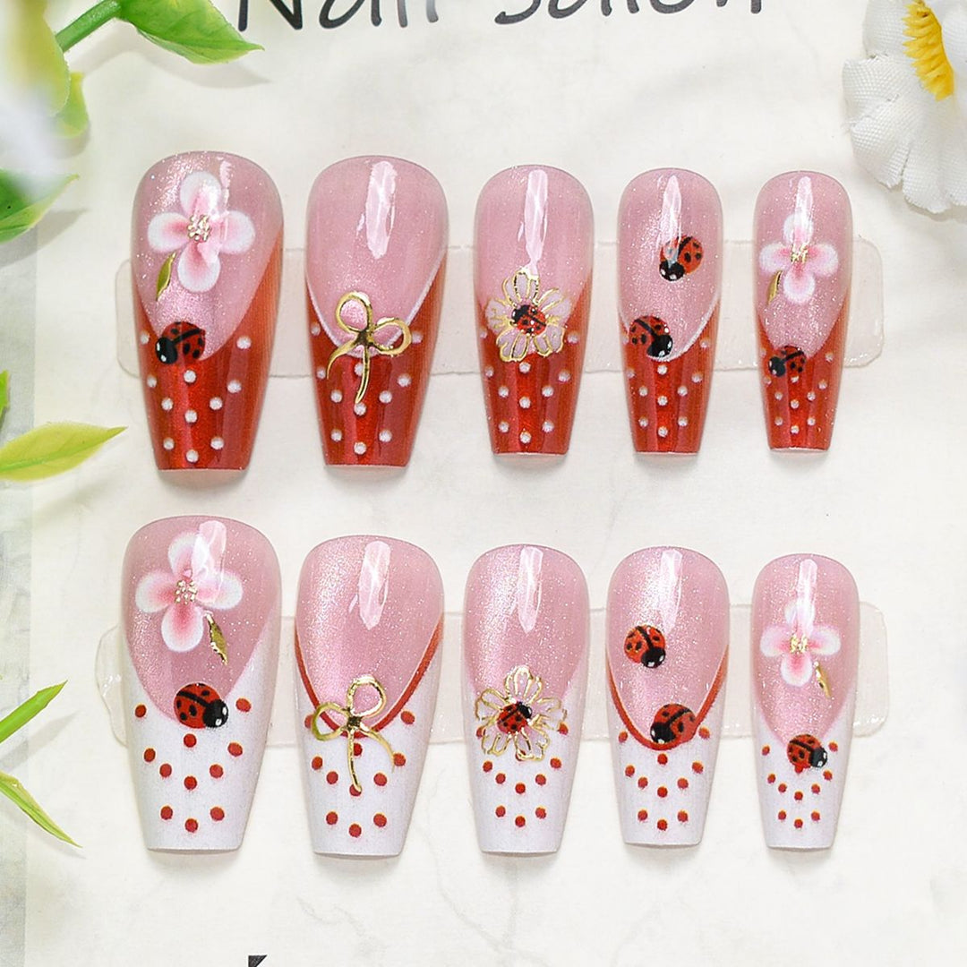 Künstlerisches Press-On-Nagelset mit Kirschblütenmuster Karnz