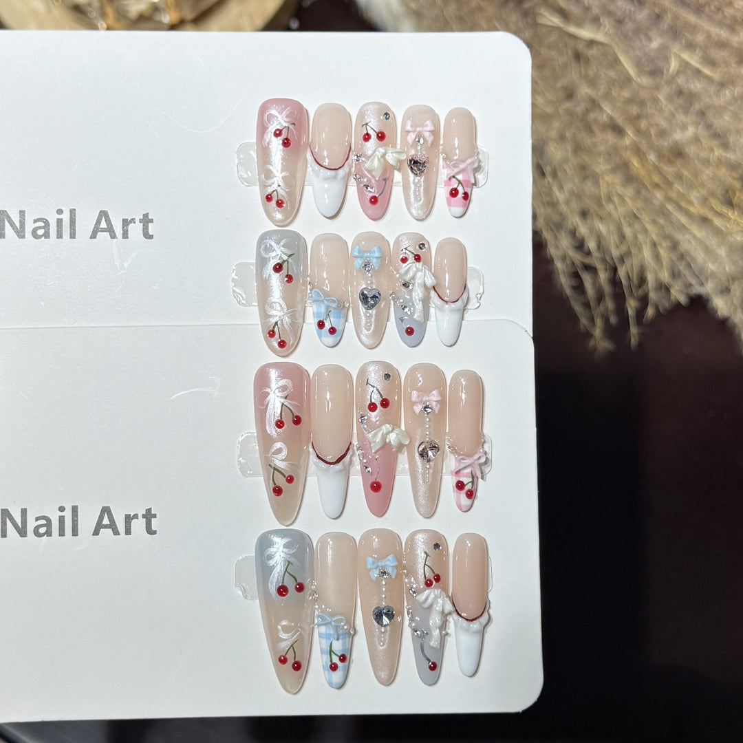 Dekorative Press-On Nagelkunst-Set mit charmantem Schleifen- und Musterdesigns Karnz