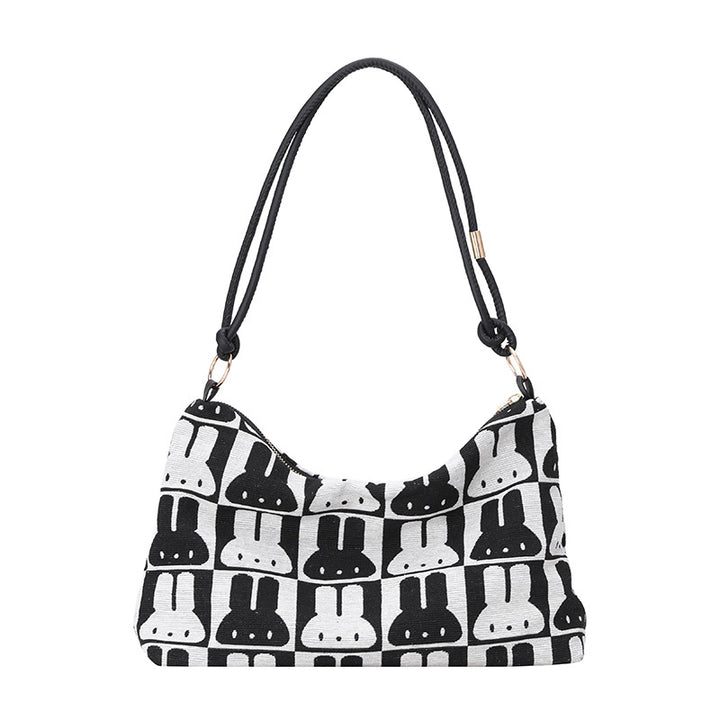 Gepunktete Schultertasche