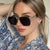 Damen elegante Sonnenbrille mit markantem Geometrie-Rahmen Karnz