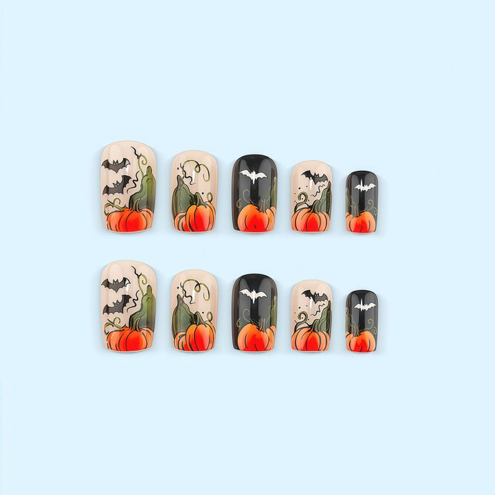 Kunstnägel im Halloween-Design mit Kürbissen und Geistern Karnz