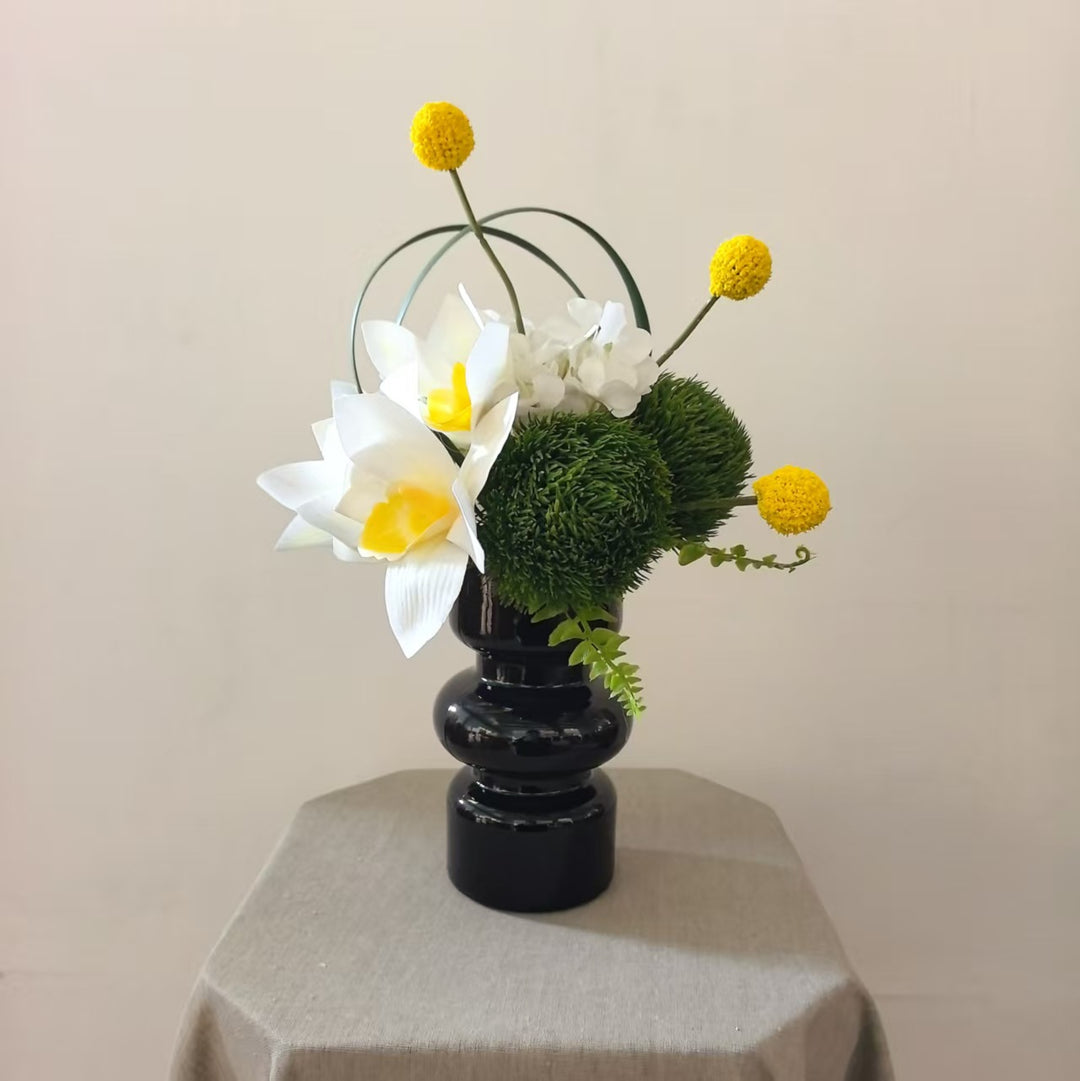 Elegante dekorative Orchideenarrangement