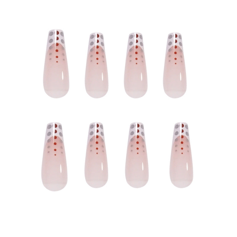 Kunstvolle Nagelverlängerungen mit eleganten Dots und schimmerndem Ombré Karnz