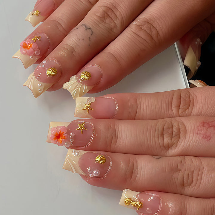 Tropische Muschel- und Blumen-Press-On-Nagelkunst Karnz