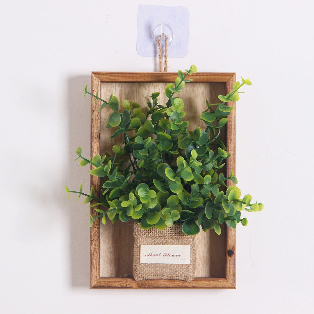 Wandmontierte dekorative florale hängende Pflanzgefäß