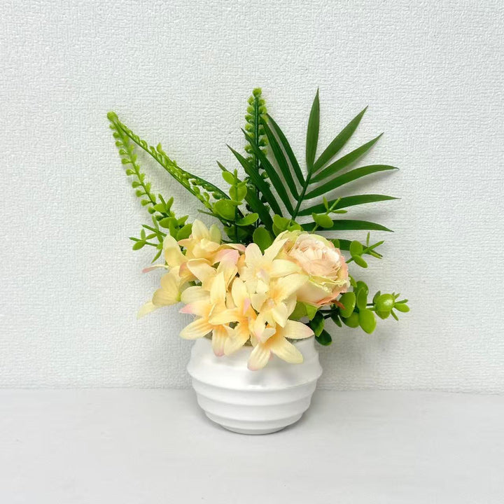 Künstliche Blumenanordnung