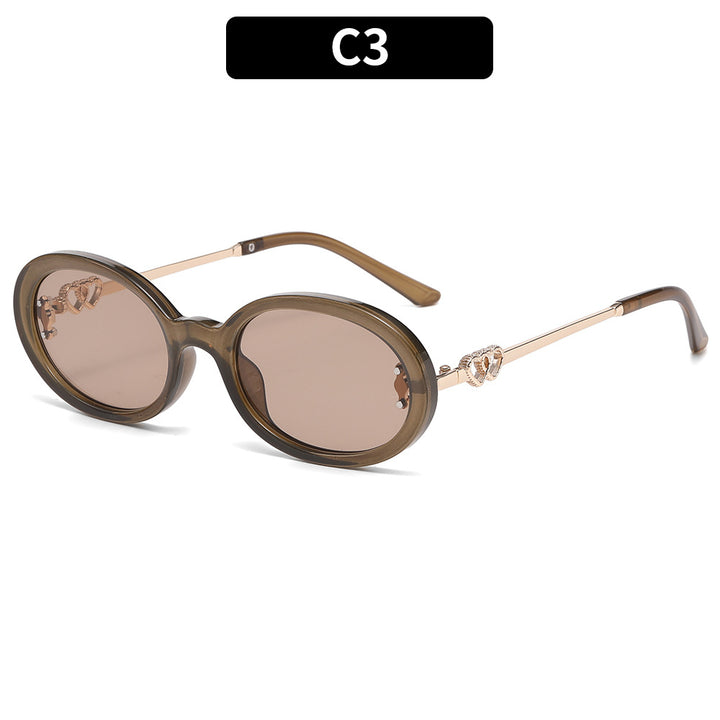 Premium ovale Rahmen-Sonnenbrille mit dekorativen Metallelementen