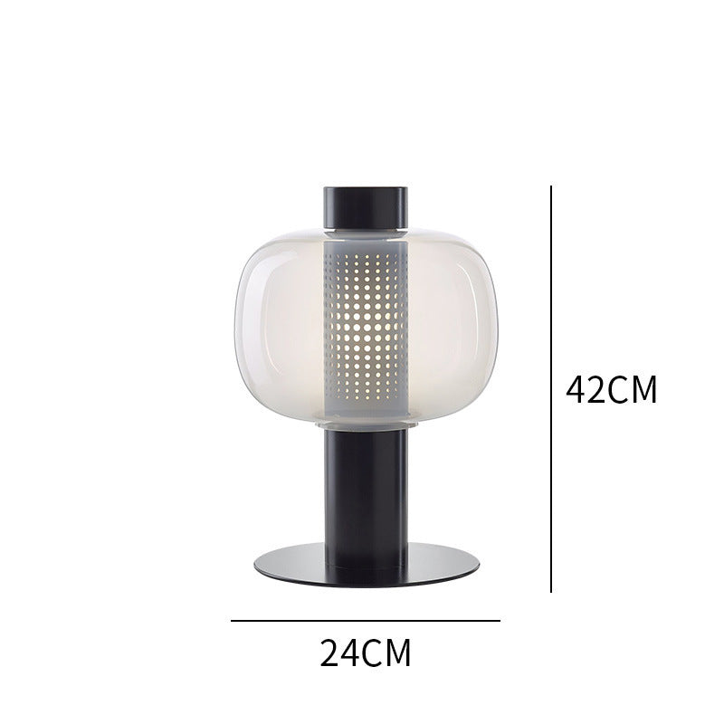 Künstlerische Tischlampe mit elegantem Glasschirm