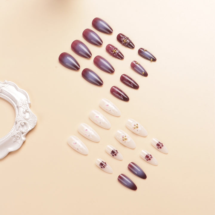 Blumenverzierte Stiletto-Nagelkunst Karnz