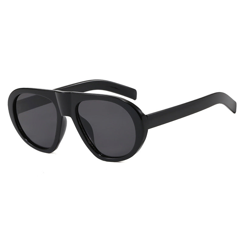 Damen auffällige Sonnenbrille mit futuristischem Rahmen und robustem Design Karnz