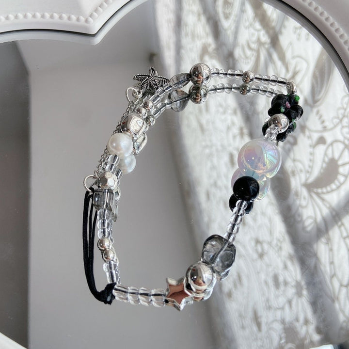 Eleganter Perlen-Charm-Brillenhalter Karnz
