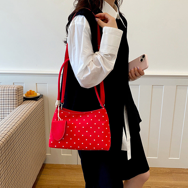 Chice gepunktete Handtasche