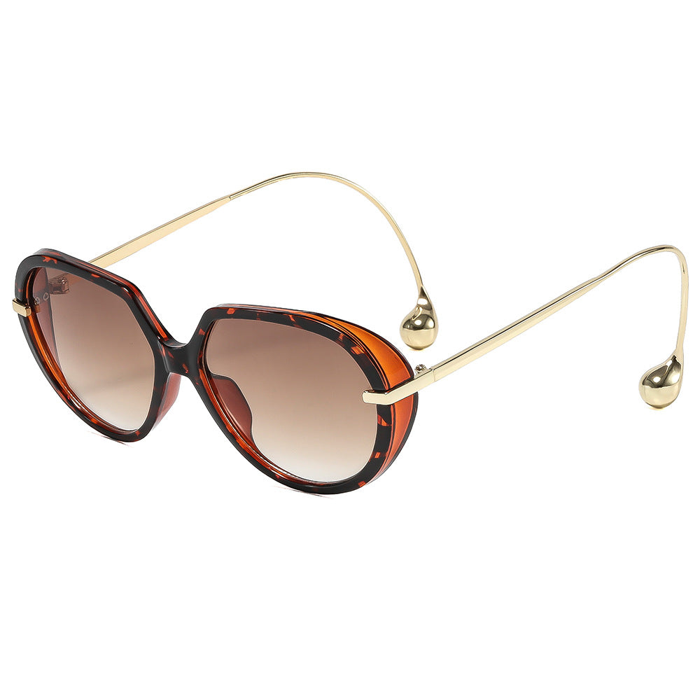 Damen Cat-Eye Sonnenbrille mit goldenen Akzenten und stylishem Rahmen Karnz
