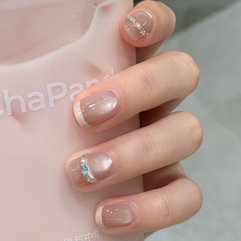 Dekoratives Press-On-Nagelset mit Stern- und Schleifenmotiven Karnz
