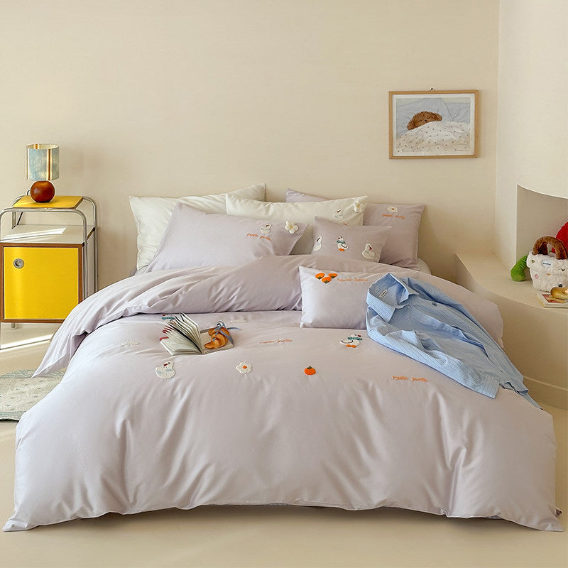 Umkehrbare bestickte Baumwollsatin Bettbezug Set mit verspielten Mini-Applikationsmotiven und Oxford Kissenbezügen