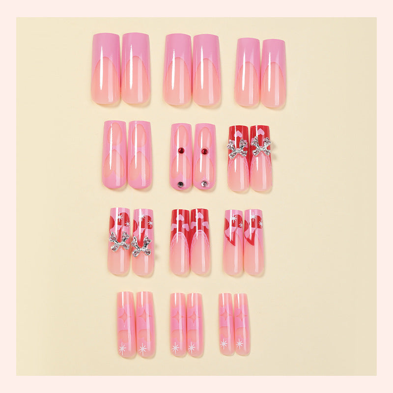 Kreatives Kunstnagelset mit Glitzer- und Herzmotiven Karnz