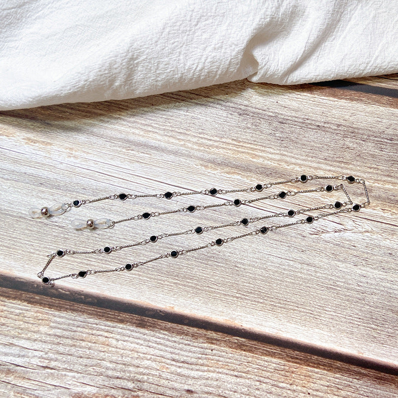 Elegante Schmuckhalterkette mit Onyx-Perlen Karnz