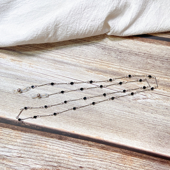 Elegante Schmuckhalterkette mit Onyx-Perlen Karnz