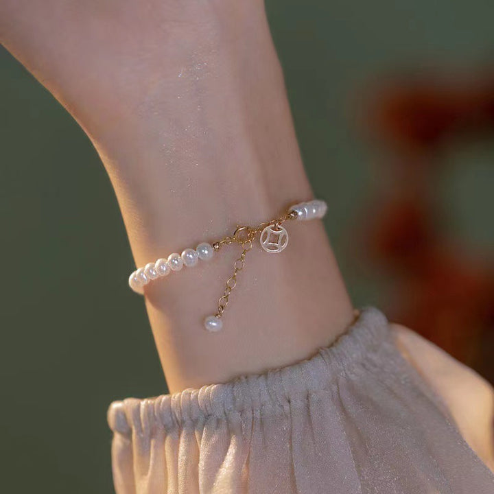 Elegante Perlen Charm Armband Karnz