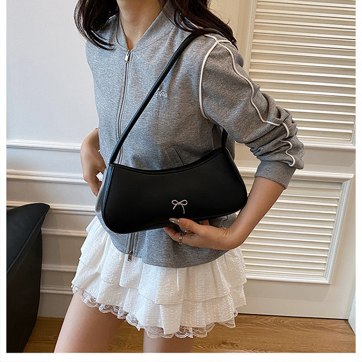 Elegante geschwungene Handtasche Karnz