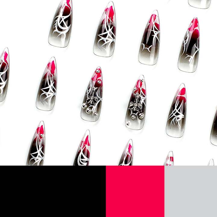 Kunstvolle Stiletto-Nägel mit eleganter Dekoration und modernen Akzenten Karnz