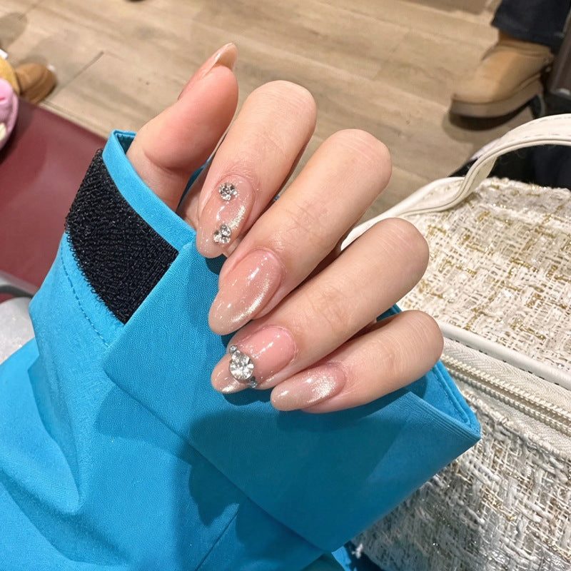 Kunstnagelset mit eleganten Strassverzierungen Karnz