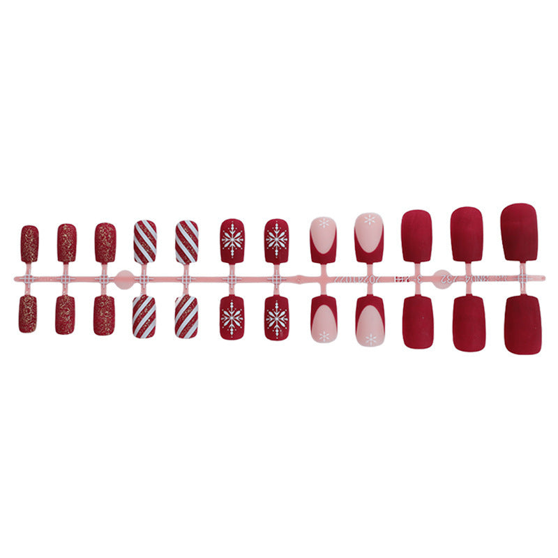 Festliches Kunstnagelset mit winterlichen Motiven Karnz