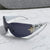 Damen futuristische Sonnenbrille mit auffälligem Design und modischen Akzenten Karnz