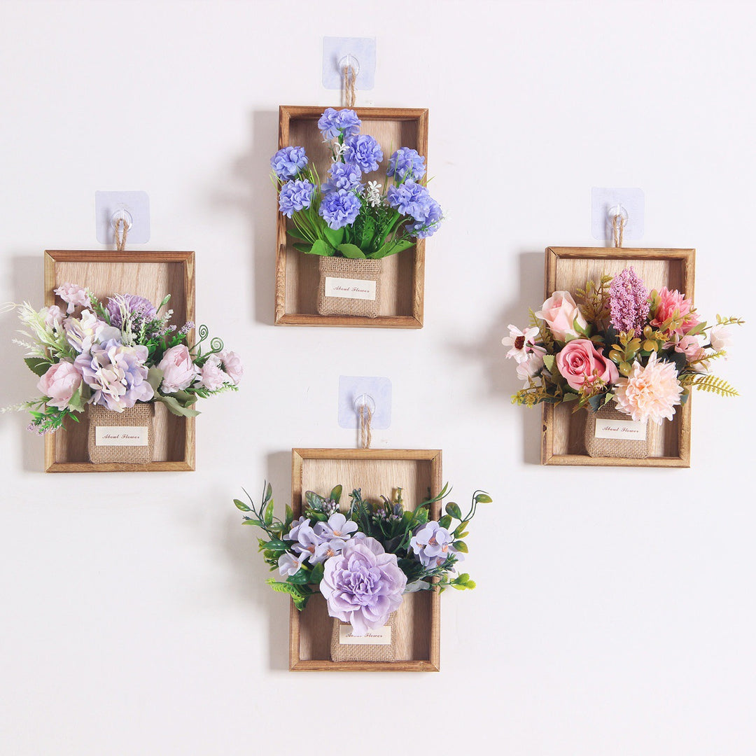 Wandmontierte dekorative florale hängende Pflanzgefäß