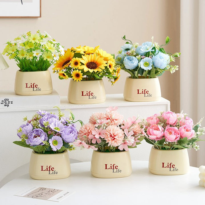 Lebensechte Dekorative Blumenanordnung
