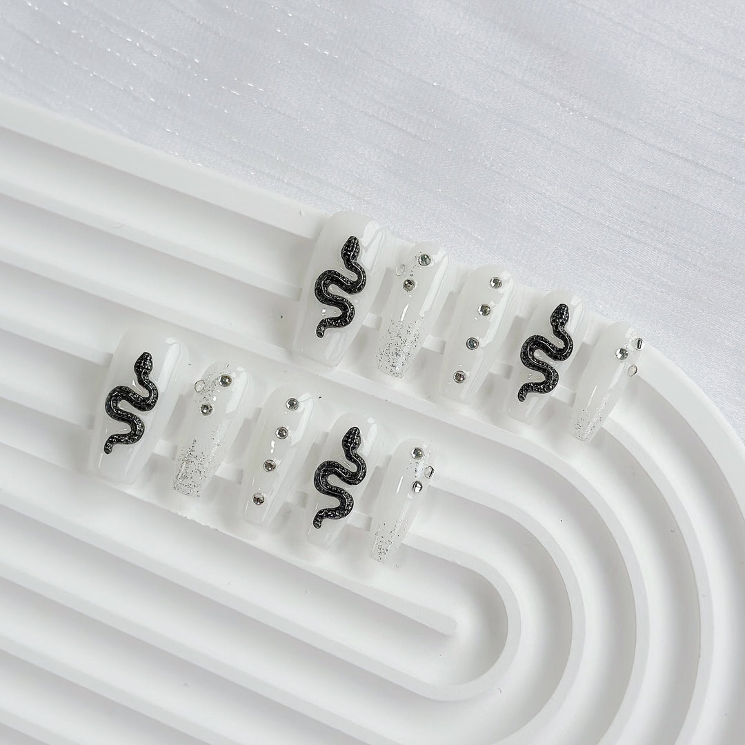 Künstlerische Schlangen-Themen Drucknägel