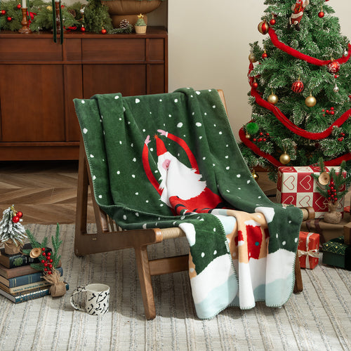 Weihnachtskuscheldecke mit Geschenk- und Lebkuchenmuster