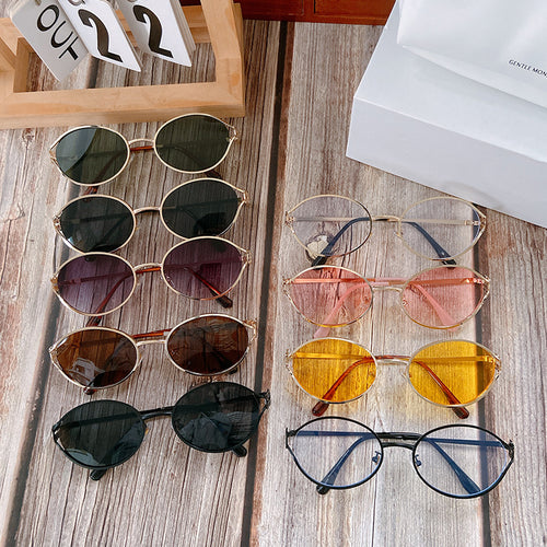 Runde Sonnenbrille mit Goldenen Akzenten Karnz