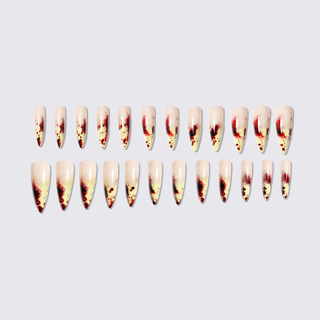 Künstlerisches Stiletto Press-On Nagelset mit tropfendem Design Karnz