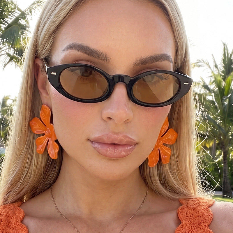 Damen Cat-Eye Sonnenbrille mit modernem transparentem Rahmen Karnz