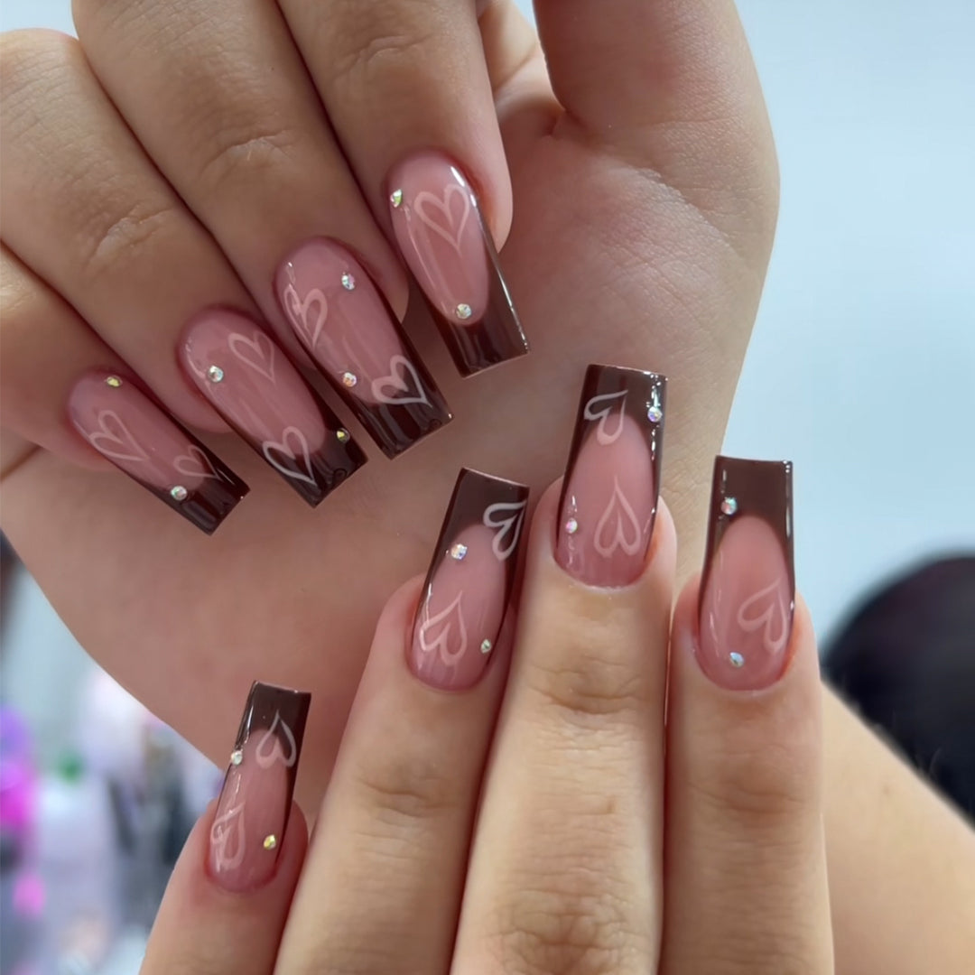 Elegante lange Acryl-Nagelverlängerungen mit Herzdesign Karnz