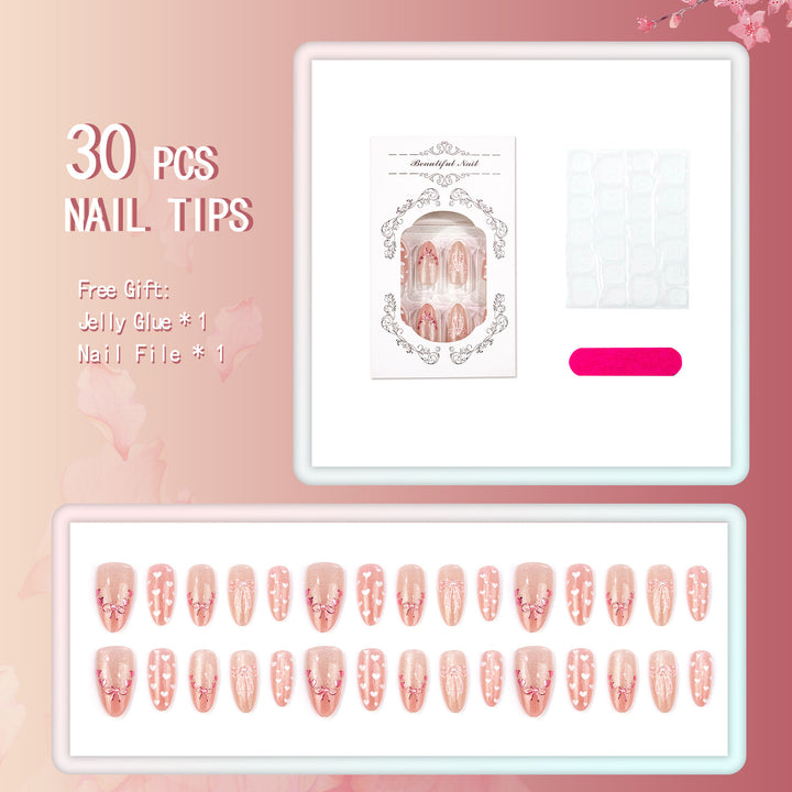 Dekoratives Press-On Nagelkunst Set mit Herz- und Schleifen-Designs