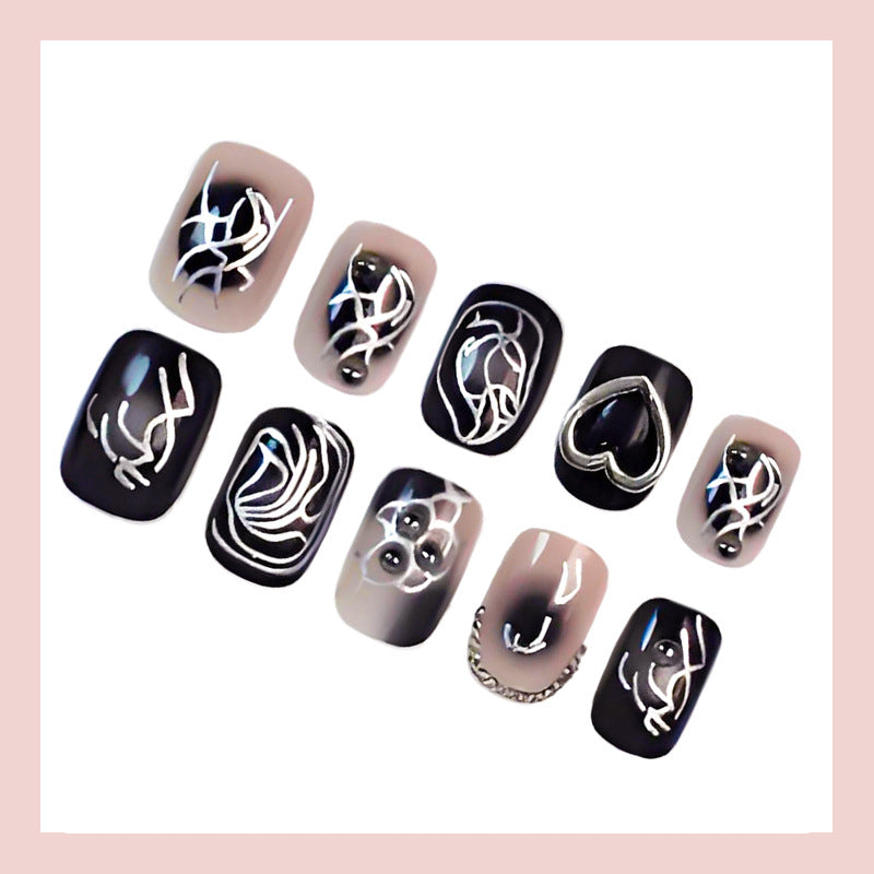 Kunstnagelset mit kreativen Schwarz-Weiß-Mustern Karnz