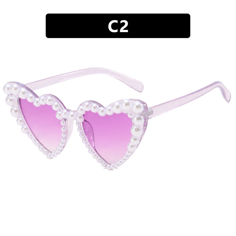 Damen Herzförmige Sonnenbrille mit perlverziertem Rahmen Karnz