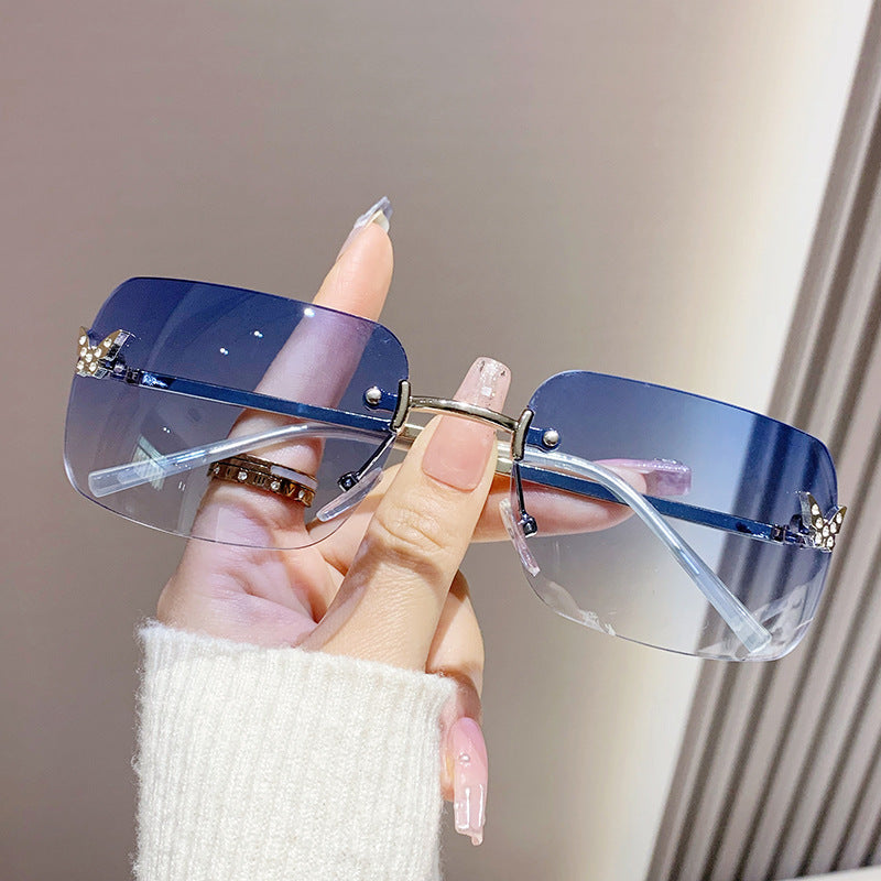 Damen elegante oversized Sonnenbrille mit gewebtem goldenen Rahmen Karnz