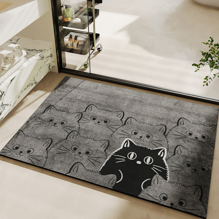 Niedlicher katzenmotivierter Badteppich