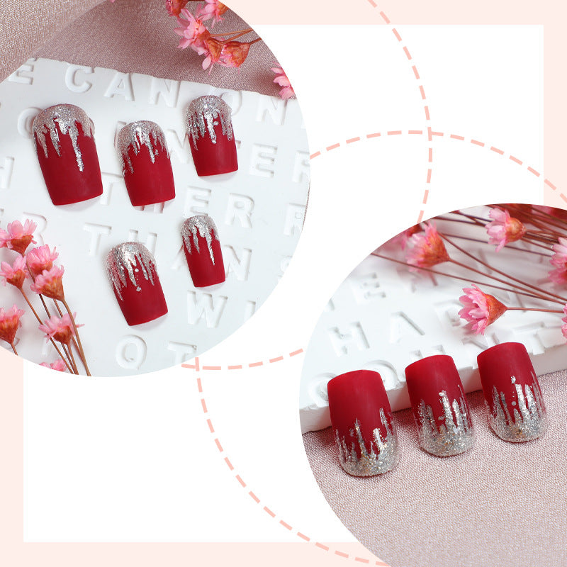 Künstlerisches Press-On Nail Set mit Silber Tropfen Design Karnz