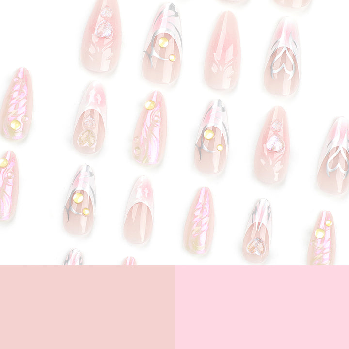 Kunstvolle Nagelverlängerungen mit zweidimensionalem Design und Glitzerakzenten Karnz