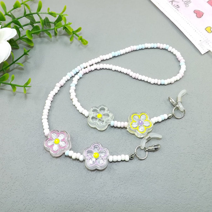Verspielte Brillenhalterkette mit Blumenanhängern Karnz