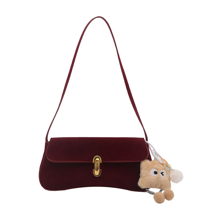 Elegante Wildleder-Handtasche mit verspieltem Schlüsselanhänger