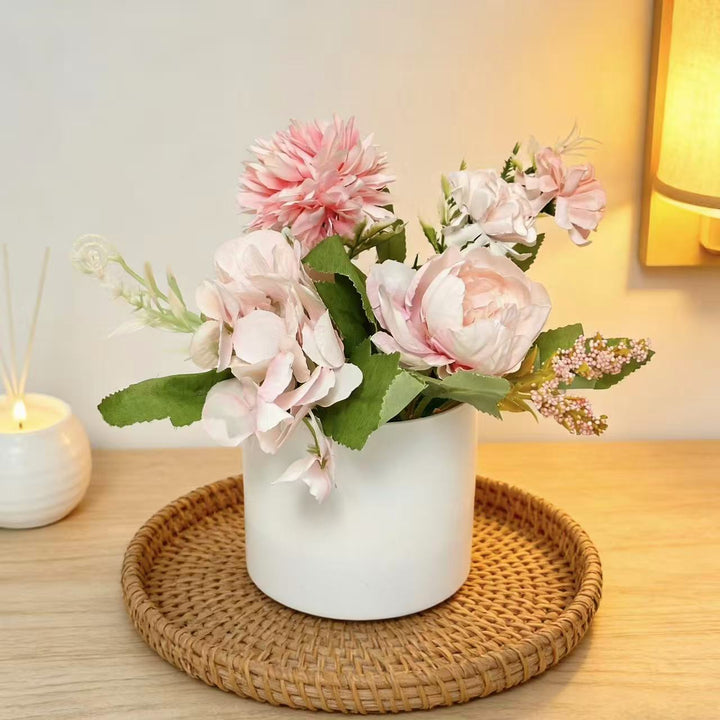 Dekoratives Blumenmittelstück für Tischdekoration