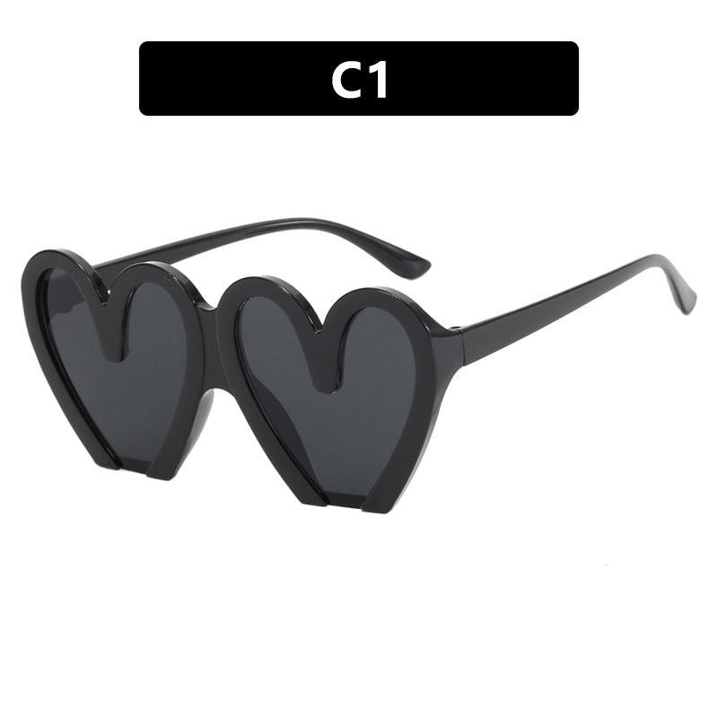 Damen Herzförmige Sonnenbrille mit robustem Kunststoffrahmen und UV-Schutz Karnz