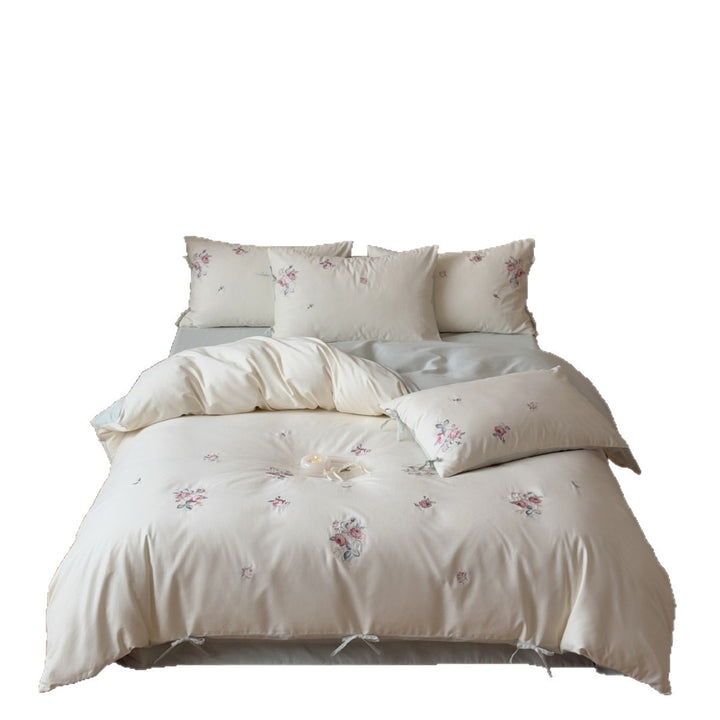 Luxuriöses Baumwoll-Bettwäsche-Set mit zarter Blumenstickerei und Wendekissenbezügen