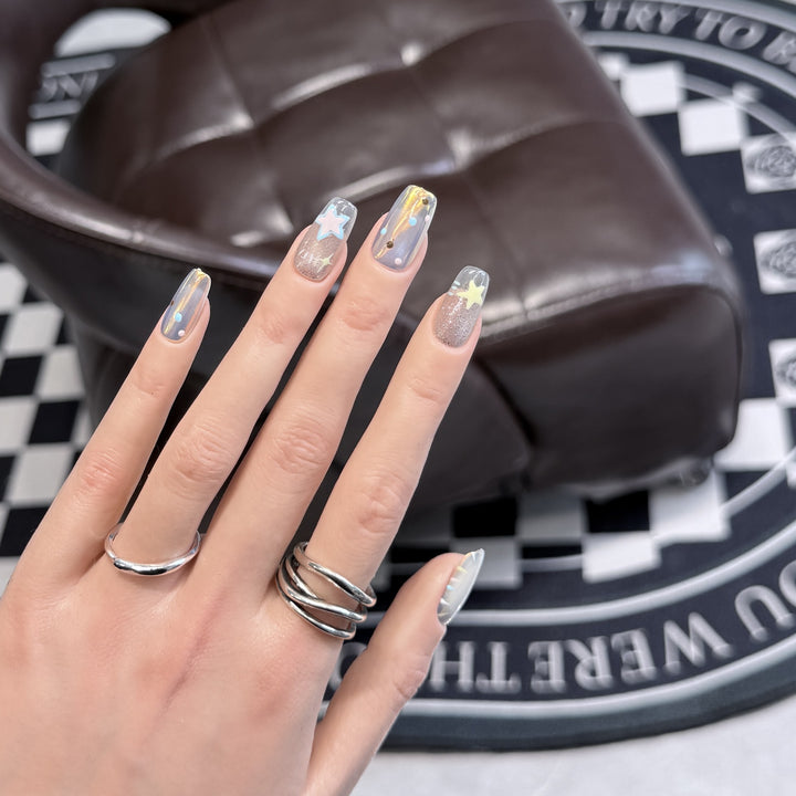 Künstlerisches Sternen Traum Press-On Nagelset Karnz
